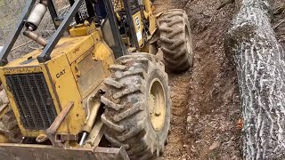 Caterpillar 518 Skidder with some heavy skids [upl. by Odnomor]