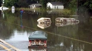 Eerie Coffins Seen Floating Through Flooded Louisiana Streets [upl. by Wilfrid]