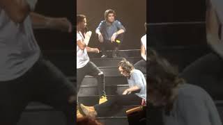 One Direction Louis untied Liams shoelaces and Harry tied them back shorts [upl. by Hulbard]